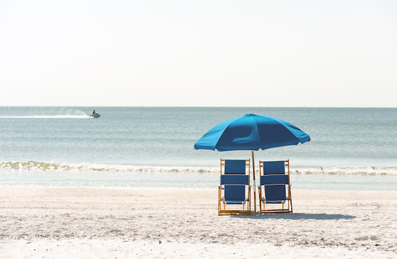 beach chairs and umbrella