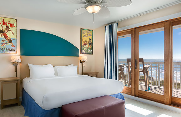 bedroom image with view of ocean