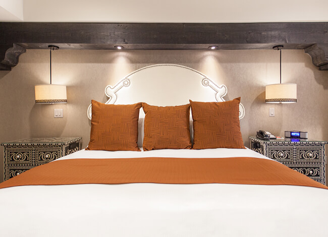 king bed in almeria suites