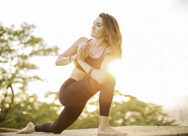girl doing yoga in nature