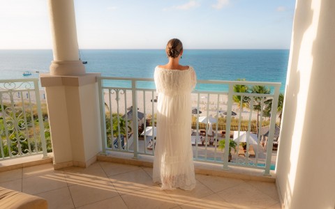 bride overlooking the beach view