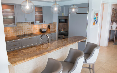 kitchen with breakfast bar and barstools