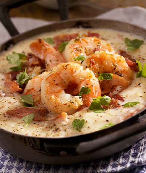 a bowl of shrimp and grits