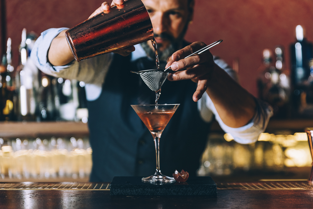 bartender pouring cocktails