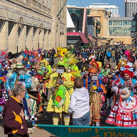 people in a carnival street parade