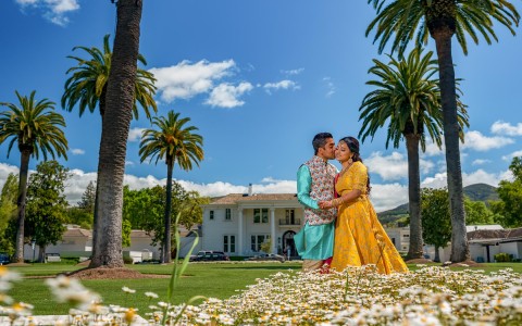 a bride and groom embrace in front of silverado during the day 