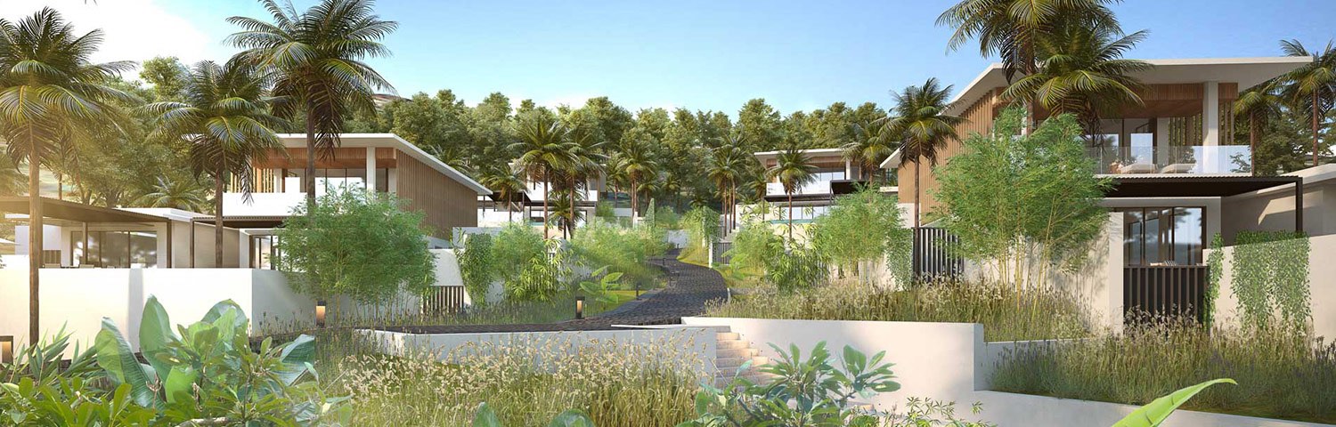 A view of the Hillside Villas tucked away by palm trees and other lush greenery