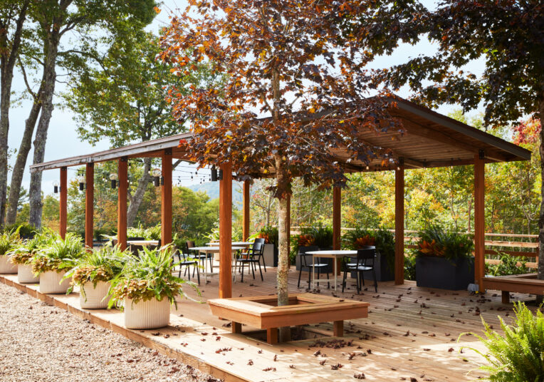 outdoor tables with trees