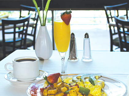 Breakfast plate with coffee and mimosa