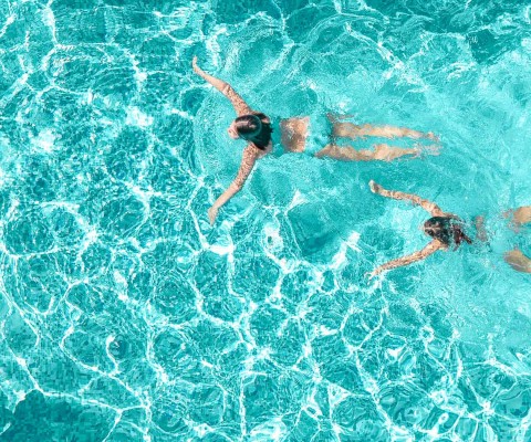Overhead shot of little girls in pool