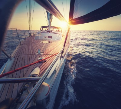 sunset at the sailboat deck while cruising