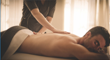 man having a back massage at the Spa