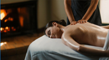 lady laying down having a back massage