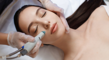 women receiving facial technology treatment