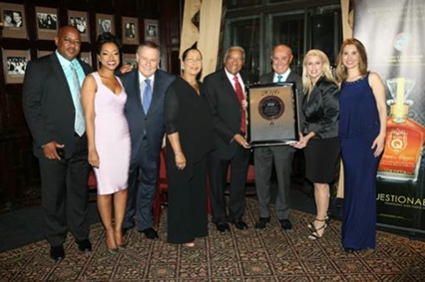 Sir Royston and Lady Hopkin (center) are flanked by (l-r) Brian Hardy; Janelle Hopkin; and WPIX television news anchor Marvin Scott; and on the right by (l-r) Joseph Cinque; Rita Cosby, CBS television’s Inside Edition; and Karen Dixon