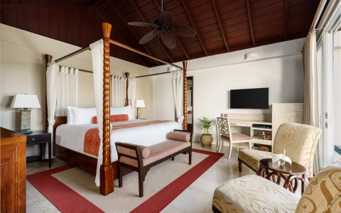 spice island beach resort image library accommodations luxury almond pool suite_bedroom 5d360adb34cba