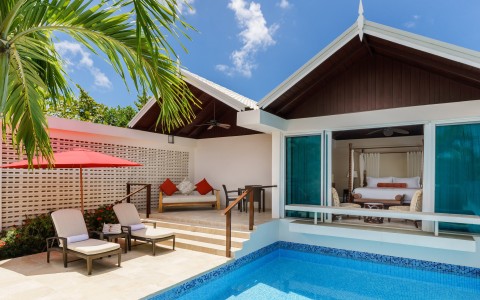 spice island beach resort image library accommodations luxury almond pool suite_exterior 5d360add26b9e
