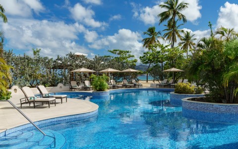 spice island beach resort image library exterior main pool 5d360bbb565e1