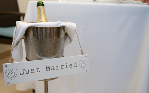just married sign and champaign
