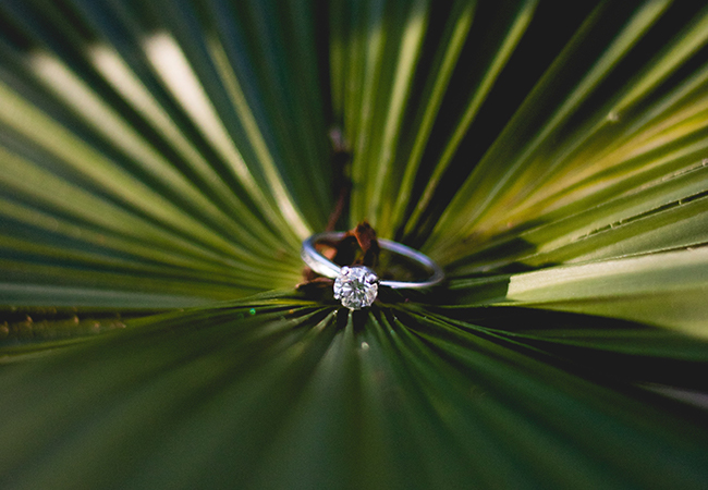 a silver wedding ring on a brand