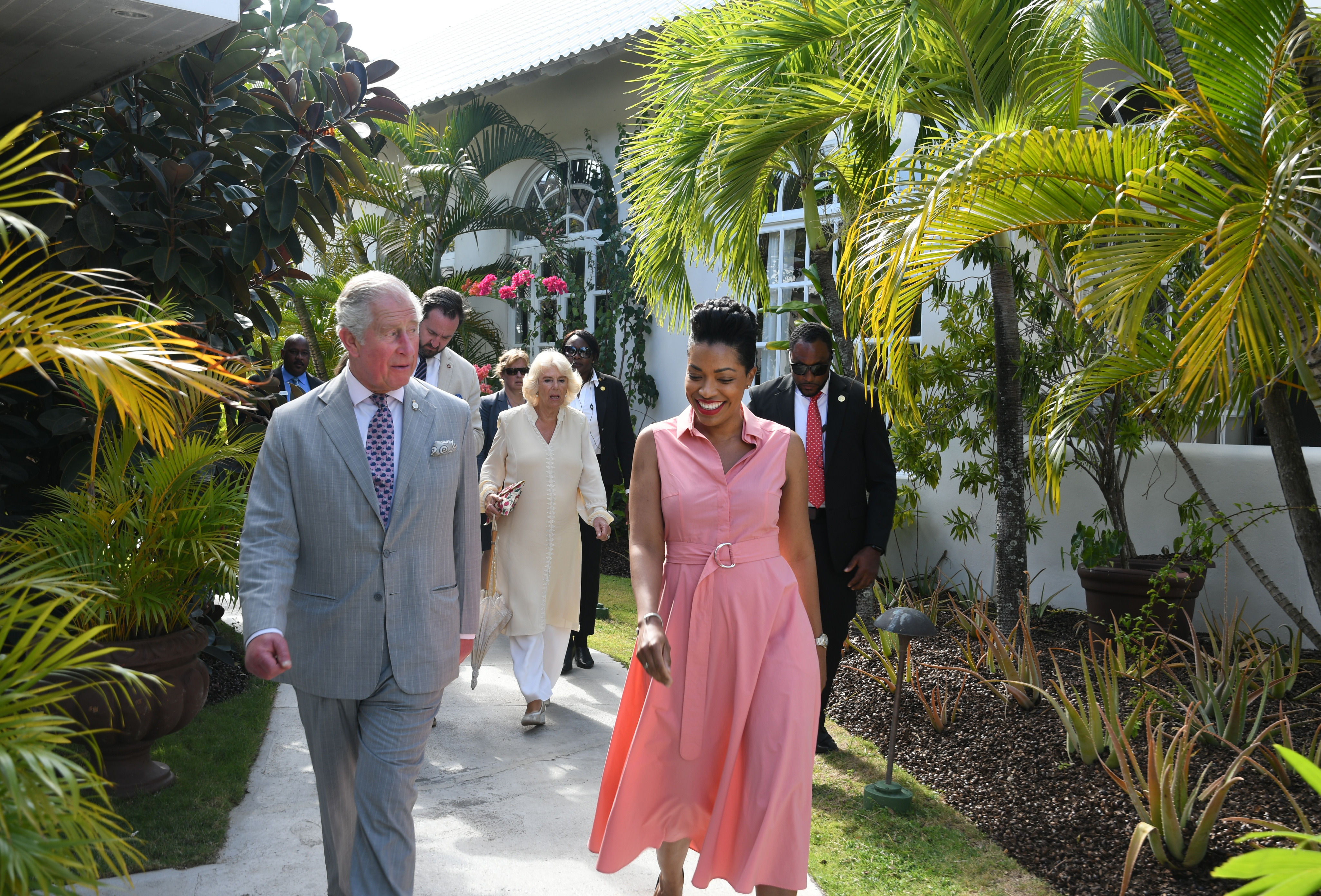 Janelle Hopkin escorts Prince Charles and Camilla, Duchess of Cornwall to their Cinnamon Suite