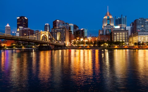 view of Pittsburgh city during the evening along the water