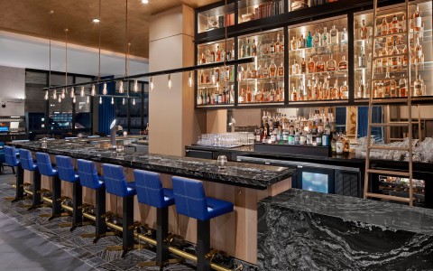 bar area of the restaurant with black granite as countertops