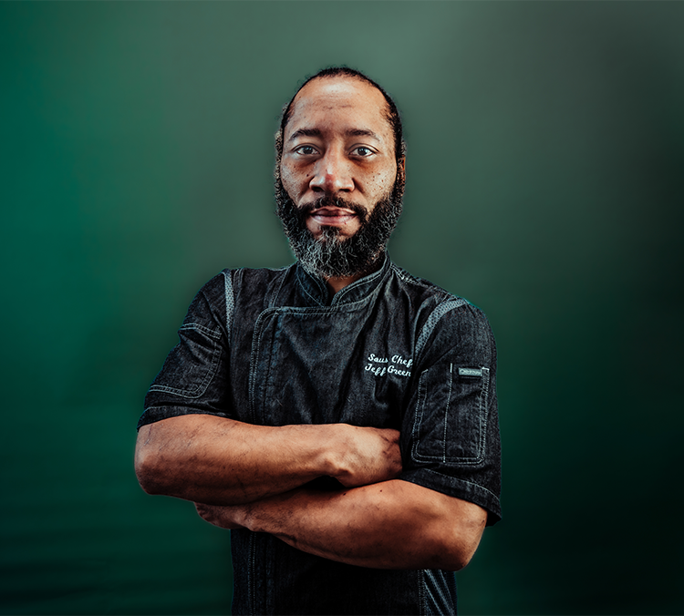 a professional headshot of Jeff Green with a green background color