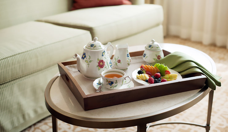tea set on coffee table with fruit tea set on coffee table with fruit