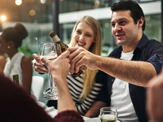friends enjoying drinks in a restaurant