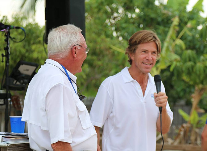 man speaking to microphone