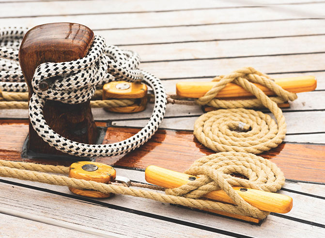 rope tied to cleat on a dock