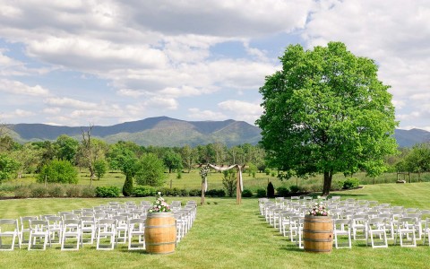 Outdoor venue with chairs set up on a sunny day