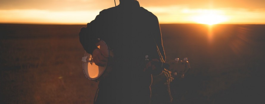 man playing banjo