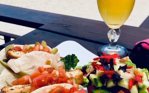 tacos with a side salad and a refreshing beer