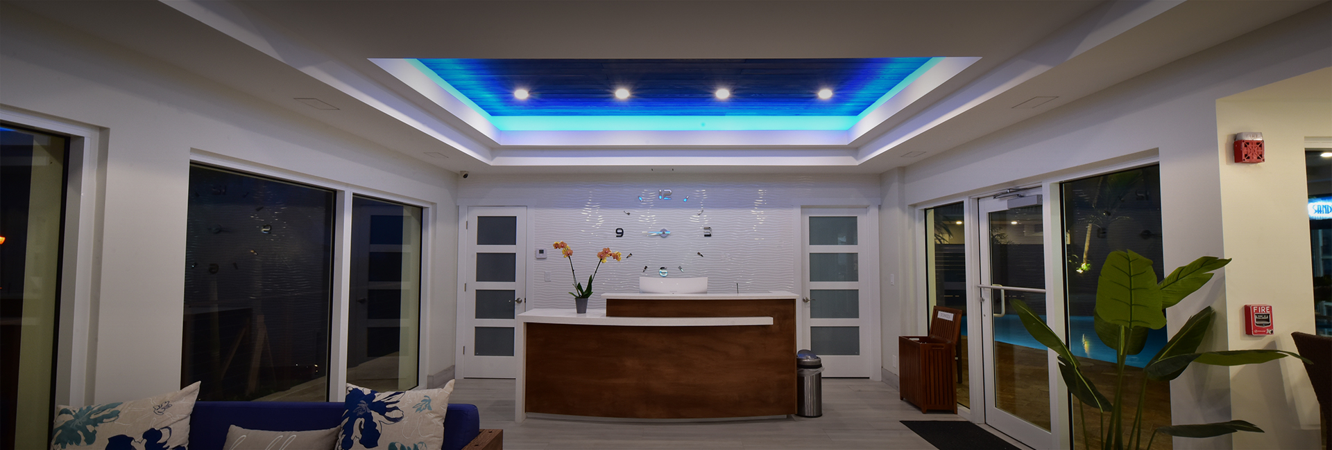 receptionist desk with modern decor with wooden accents