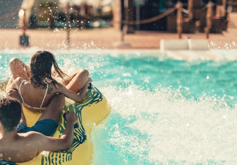 couple on water slide