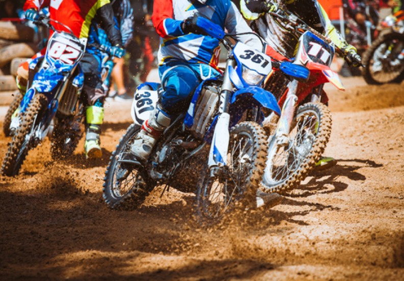 group of dirt bikes racing