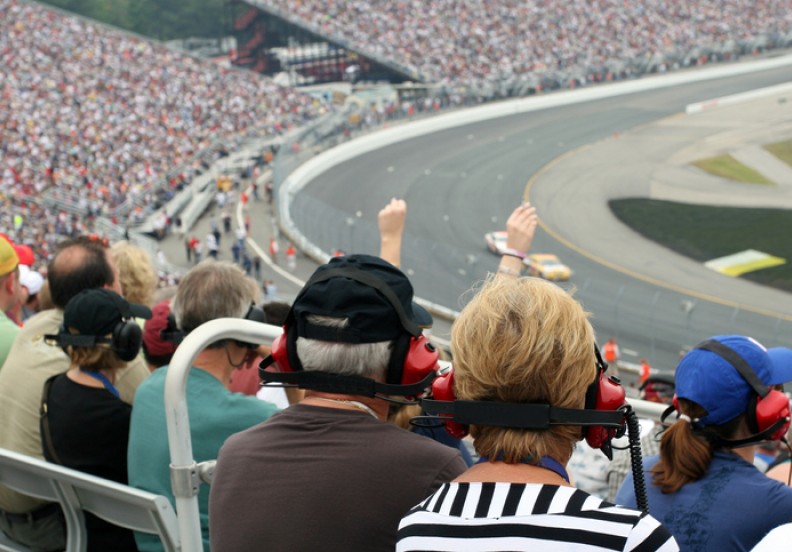 Senior Couple Fans at Racing Event