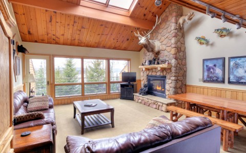 cabin themed living area filled with wildlife decor
