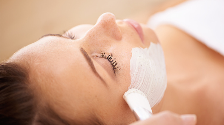 close up of a woman getting a facial
