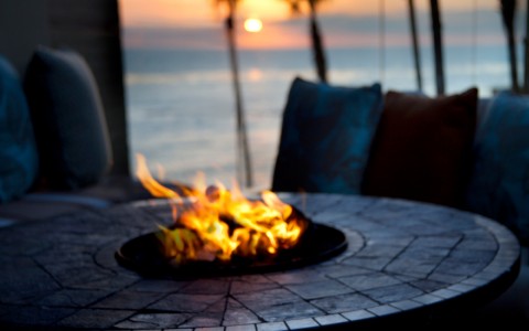 close up view of a fire-pit at sunset 