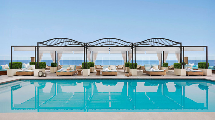 view of resort pool with pool deck