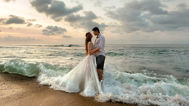 just married bride and groom on the beach