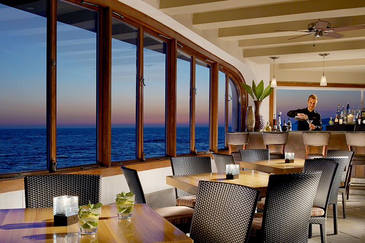 resort dining area with classy bar overlooking the ocean