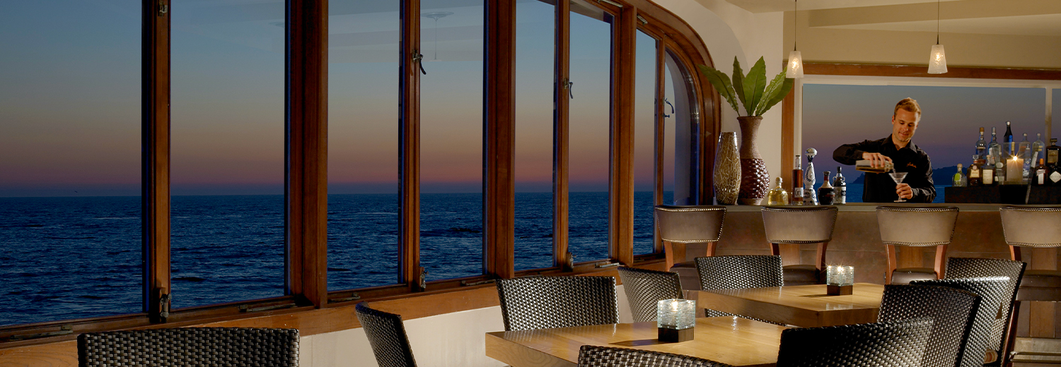 classy indoor bar overlooking the ocean