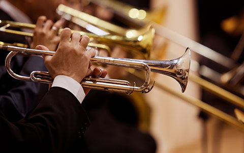 man playing trumpet