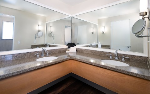 corner bathroom vanity with dual sinks