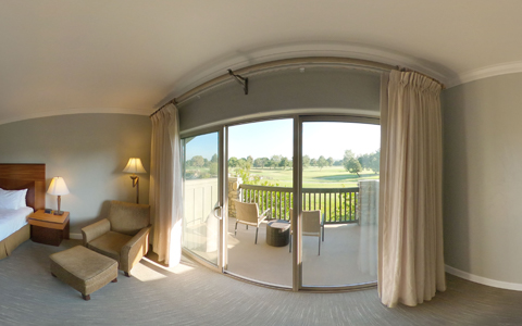 wide lense view of room with large balcony