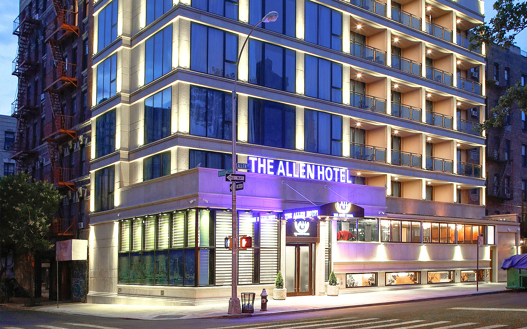 The Allen hotel entrance exterior at night